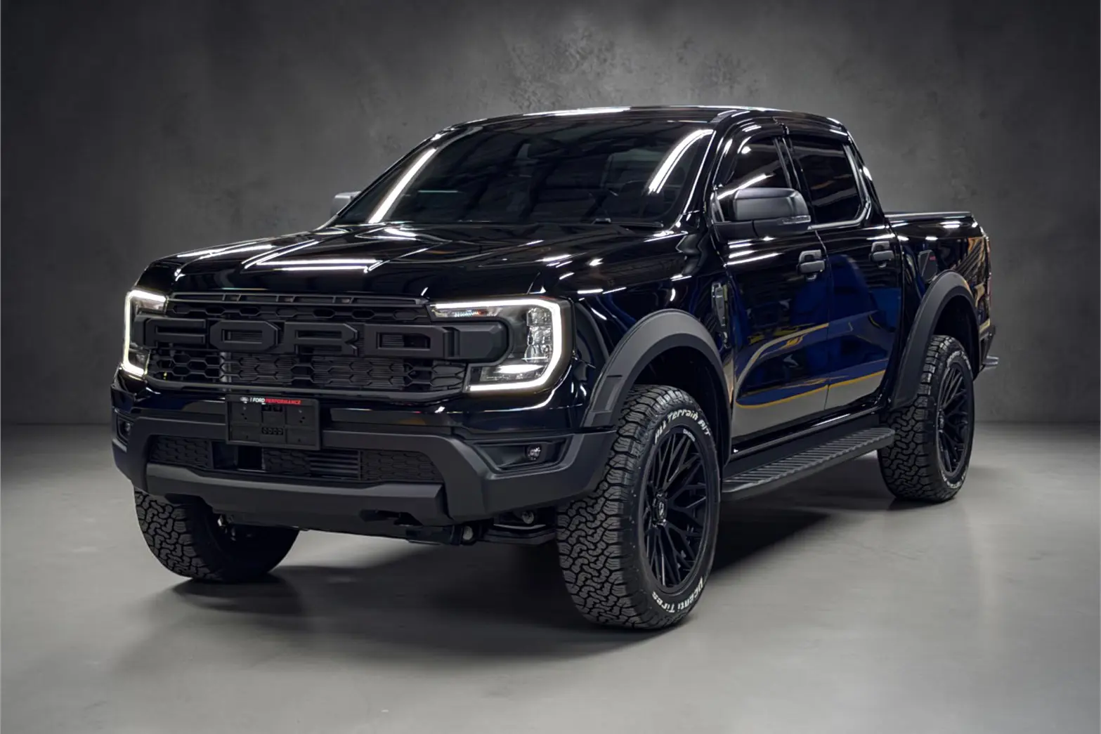 Ford Ranger DBL XLS 10AT สีดำ ใส่ชุดแต่ง Raptor